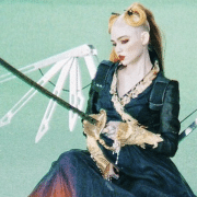 Grimes Gives Royalties to AI